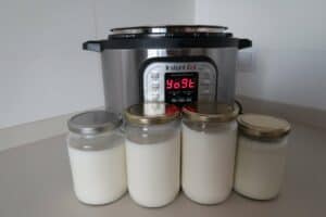 Easy Homemade Yogurt Recipe - with yogurt containers outside the instant pot